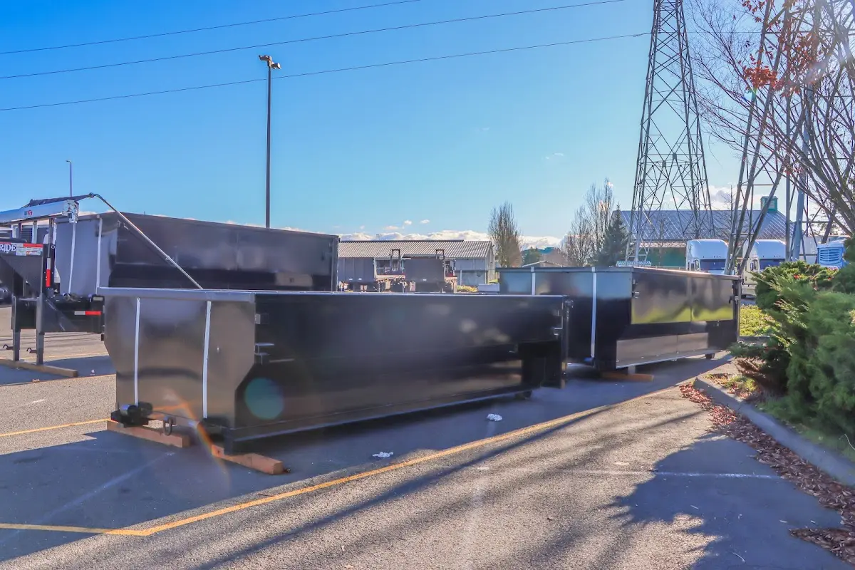 Roll-off dumpster ready for waste disposal at job site for 3 Yard Dumpster Rental in Jamestown